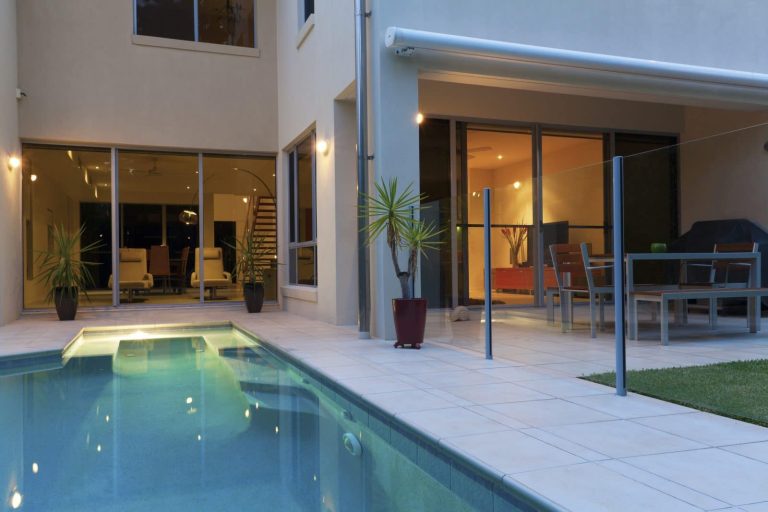 Glazed windows and doors opening onto a residential outdoor area.