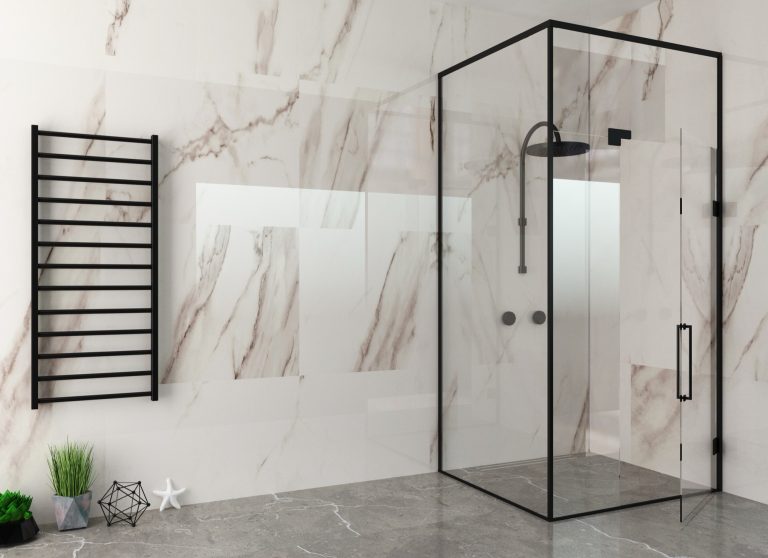 Black-framed ultra clear glass shower screen against marble walls